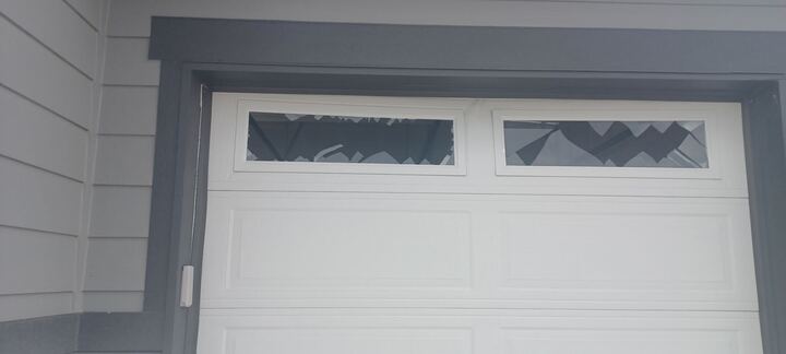 White garage door with decorative windows